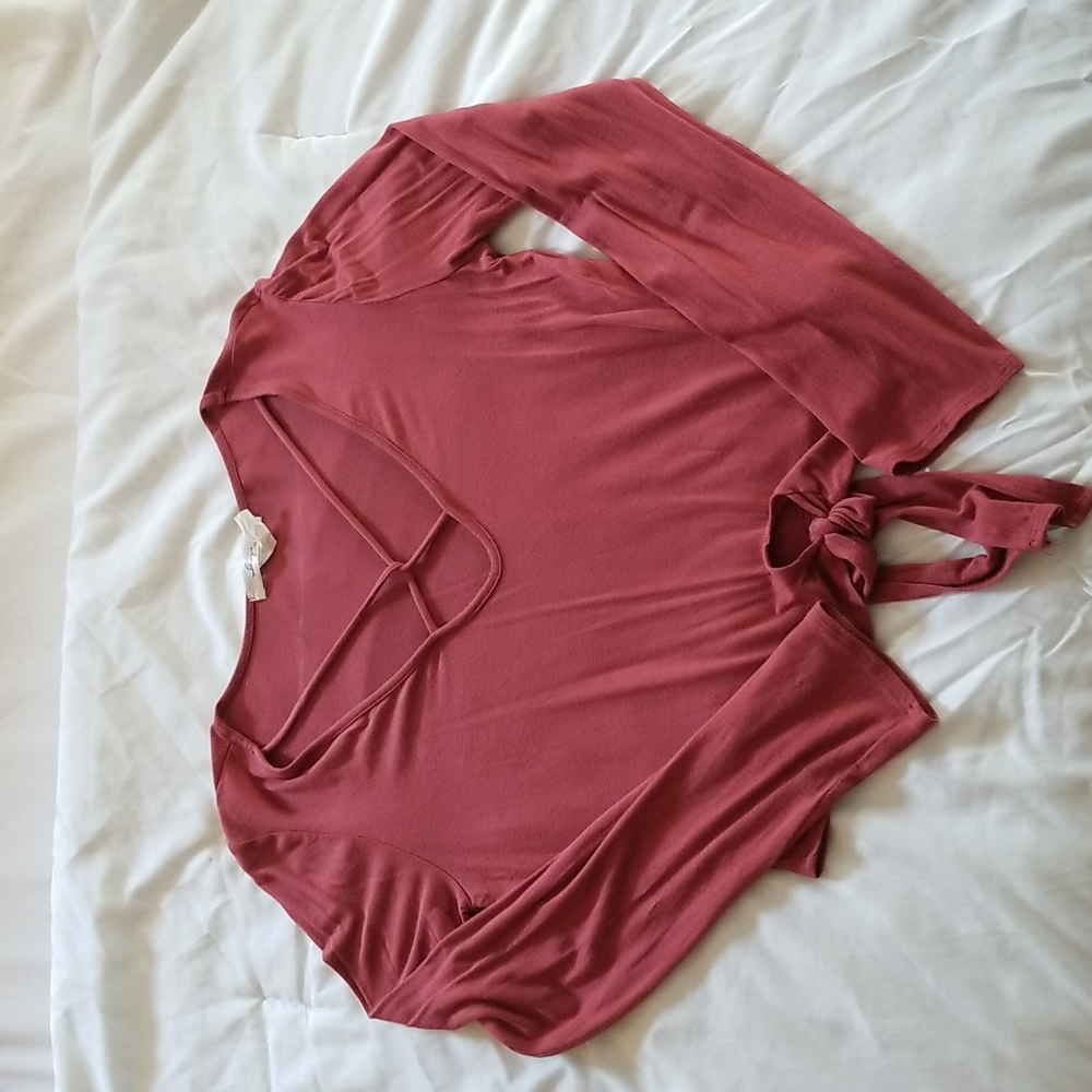 V neck, rust colored, tie front top. Size Medium. Gently worn.